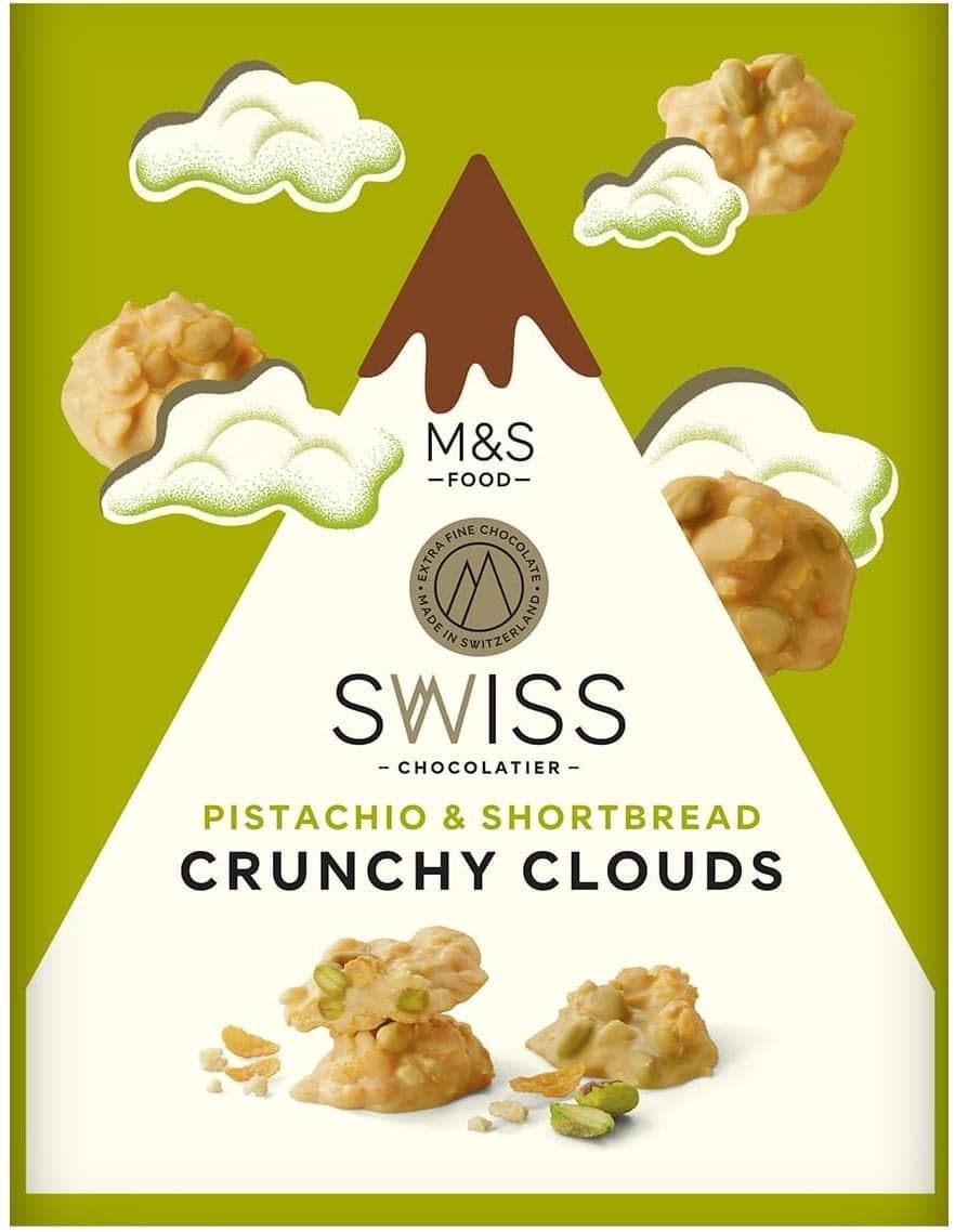 Marks & Spencer Bílá čokoláda s karamelizovaným cukrem, kukuřičnými lupínky, sušenkami a pistáciemi