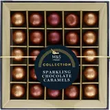 Marks & Spencer Pralinky z hořké a mléčné čokolády plněné různými náplněmi a ozdobené třpytivou cukrářskou ozdobou